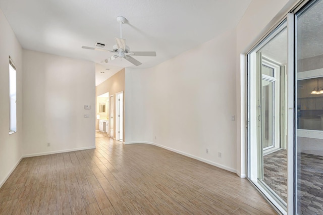 empty room featuring light hardwood / wood-style floors and ceiling fan