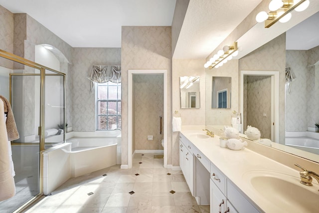 full bathroom featuring toilet, shower with separate bathtub, and vanity