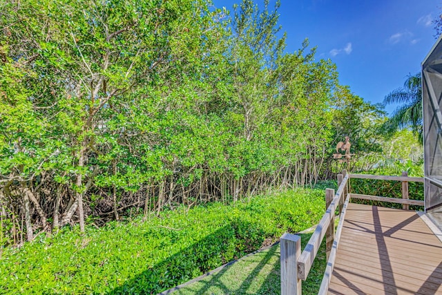 view of yard with a wooden deck