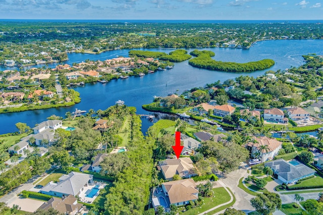 6481 Spartina Cir, Jupiter, FL 33458 - aerial overview of property's location with nearby suburban area and a large body of water