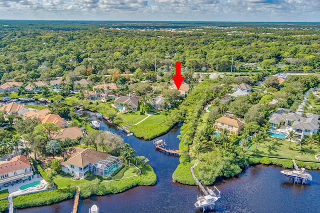 birds eye view of property featuring a water view