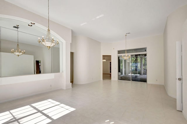 unfurnished room with light tile patterned floors and a notable chandelier