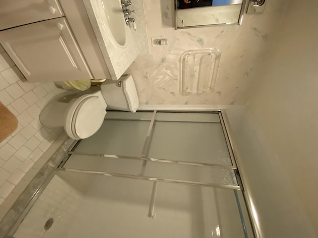 bathroom featuring tile patterned floors and toilet