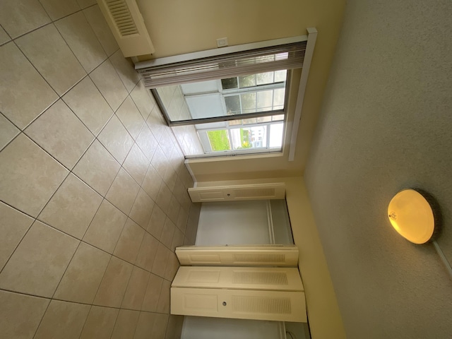 interior space with white cabinetry