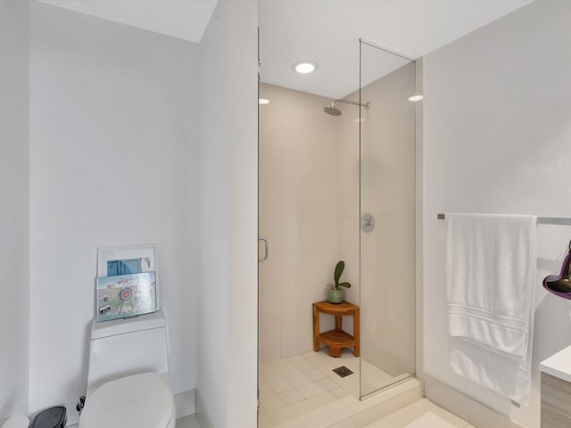 bathroom with vanity, an enclosed shower, toilet, and tile patterned floors