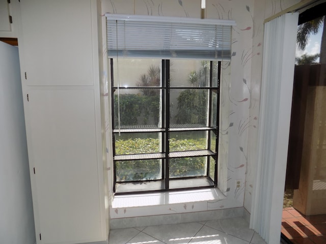 interior details featuring tile patterned floors