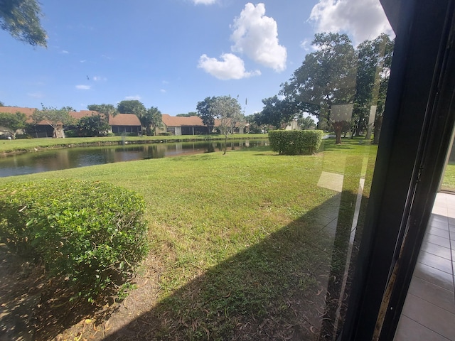 view of yard with a water view