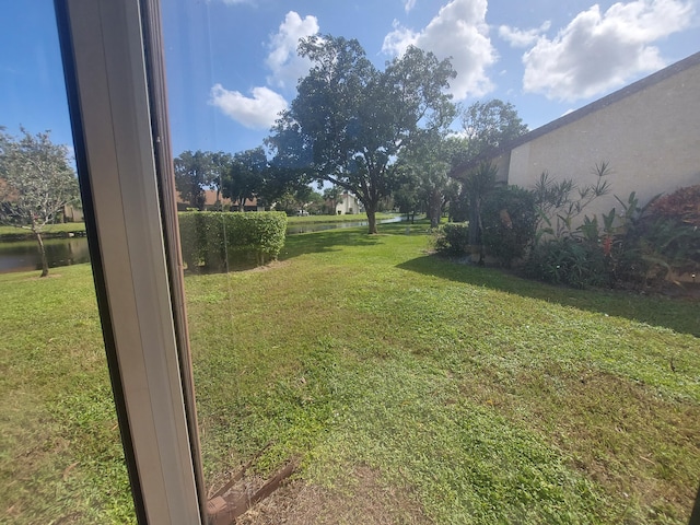 view of yard with a water view