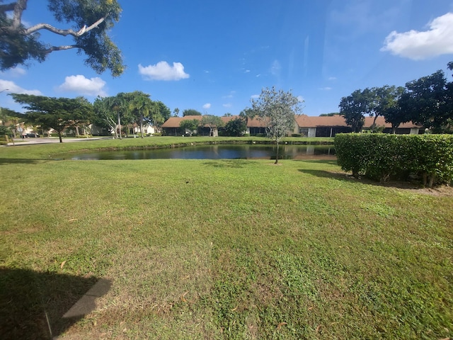 view of yard with a water view