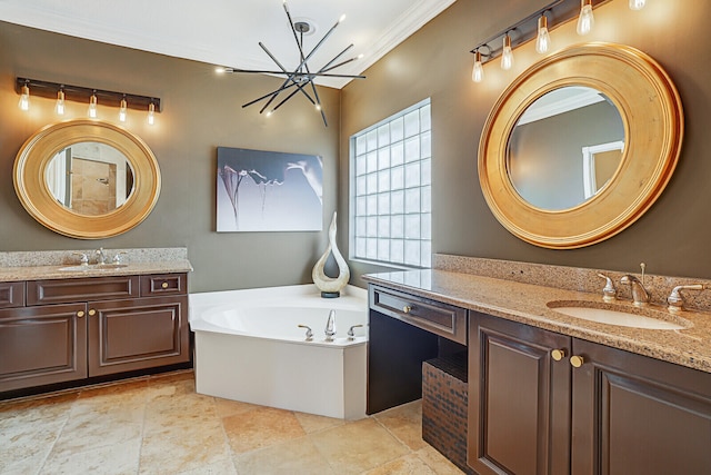 bathroom featuring a bath, crown molding, vanity, and a chandelier