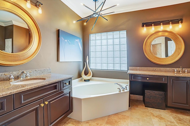 bathroom with a washtub, vanity, an inviting chandelier, and ornamental molding