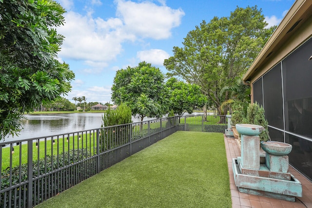 view of yard with a water view