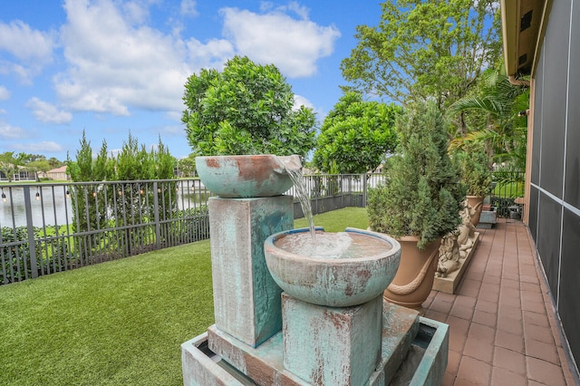 view of yard with a water view