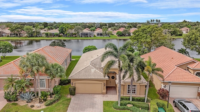 bird's eye view with a water view