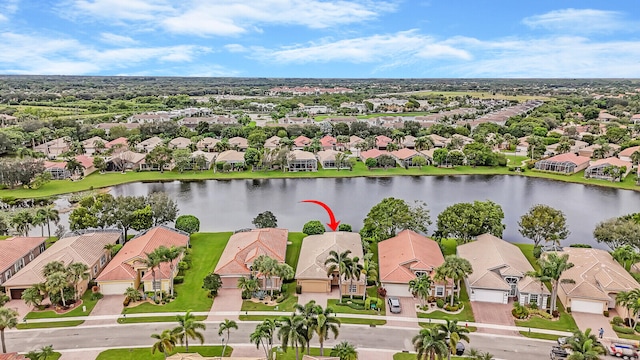 birds eye view of property featuring a water view