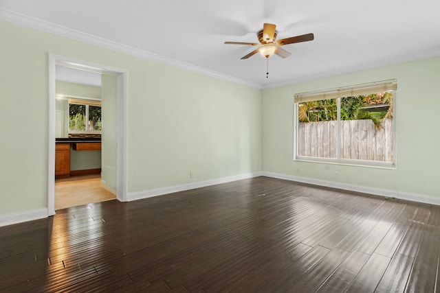 unfurnished room with crown molding, hardwood / wood-style flooring, plenty of natural light, and ceiling fan