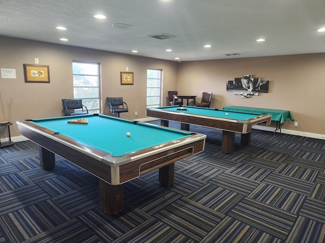 playroom with dark colored carpet