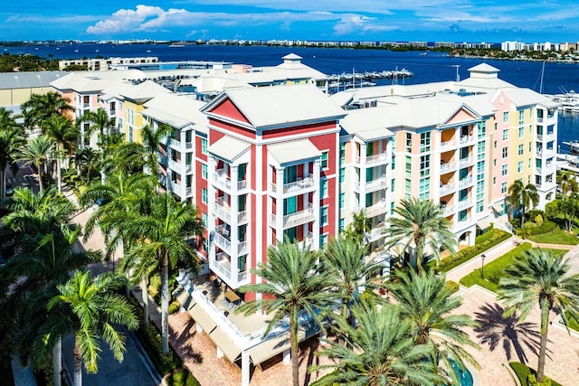 birds eye view of property with a water view