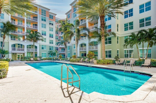 view of swimming pool with a patio area