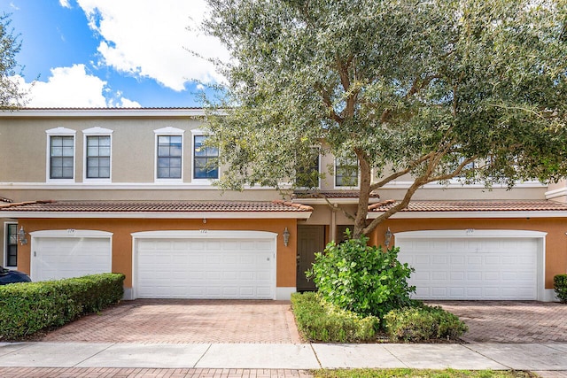 view of front of home with a garage