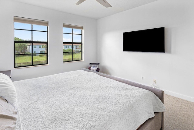 bedroom featuring carpet floors and ceiling fan