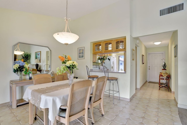 dining room with light tile patterned floors