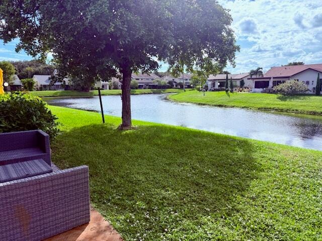 view of yard with a water view