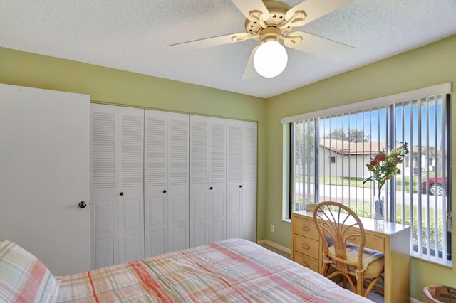 bedroom featuring a closet and ceiling fan