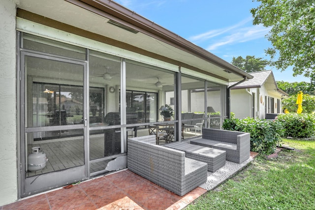 view of patio with a sunroom