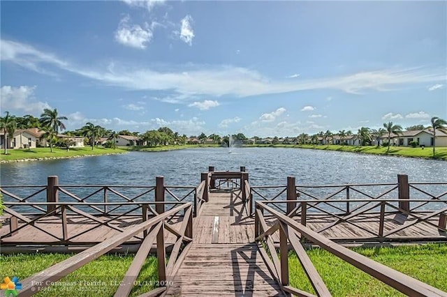 view of dock with a water view