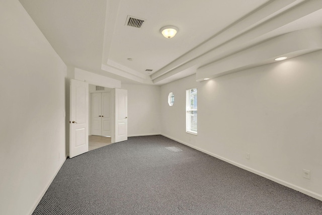 empty room featuring carpet floors