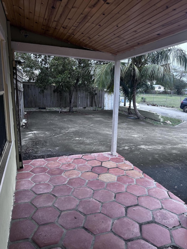 130 NE 4th Ave, Boynton Beach, FL 33435 - fenced backyard featuring a patio and a carport