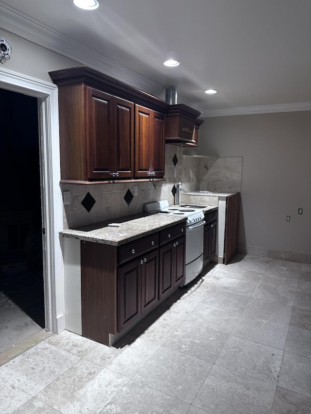 kitchen with ornamental molding, white stove, dark brown cabinets, and backsplash