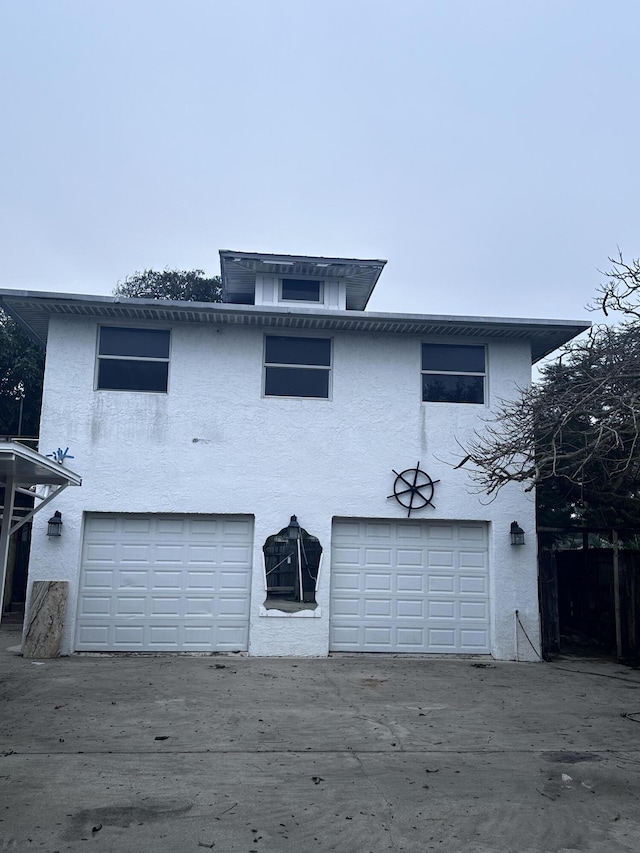 front of property with a garage