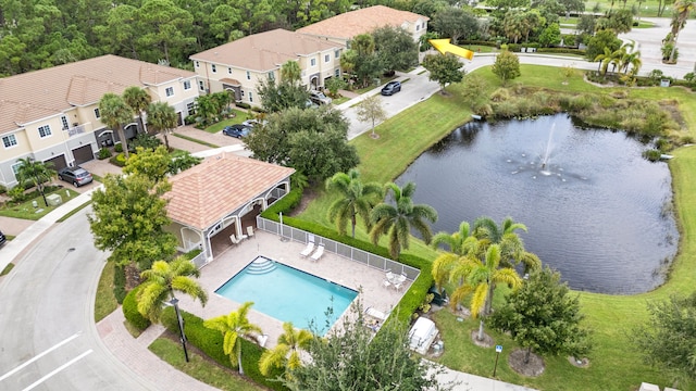 bird's eye view featuring a water view and a residential view