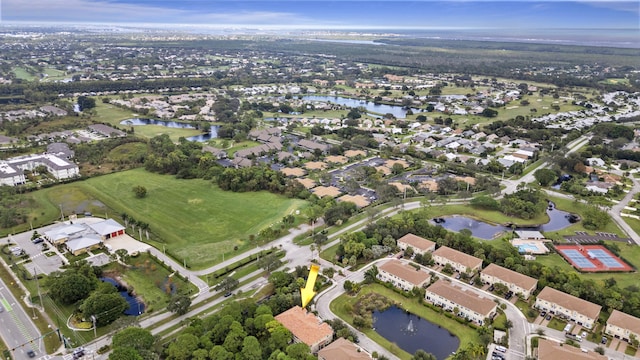 bird's eye view with a water view and a residential view