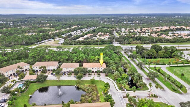 bird's eye view with a water view and a residential view