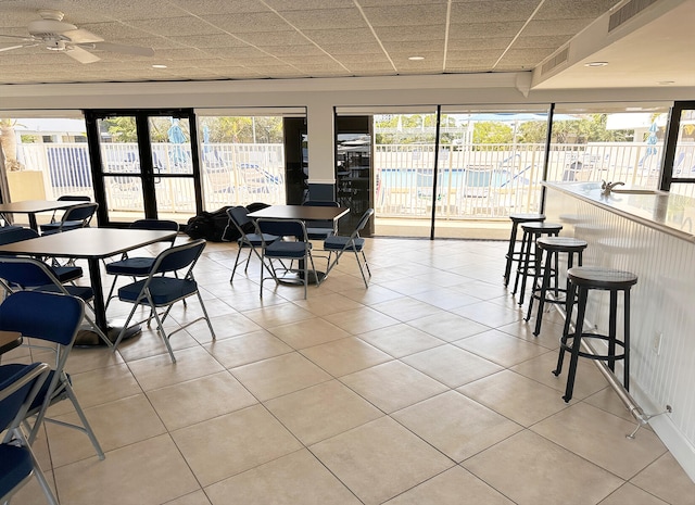 tiled dining area with french doors