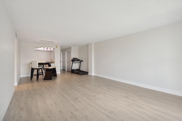 living room with light hardwood / wood-style flooring