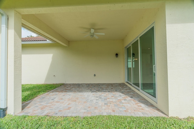 view of patio / terrace featuring ceiling fan