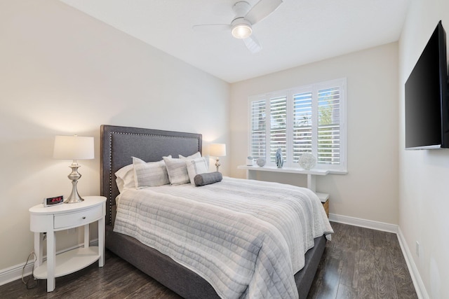 bedroom with dark wood-type flooring and ceiling fan