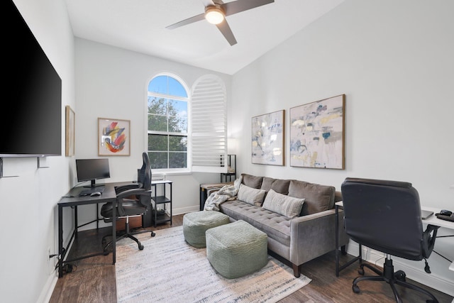 office space featuring lofted ceiling, dark wood-type flooring, and ceiling fan