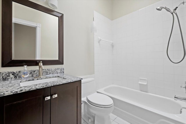 full bathroom with toilet, tiled shower / bath combo, vanity, and tile patterned flooring