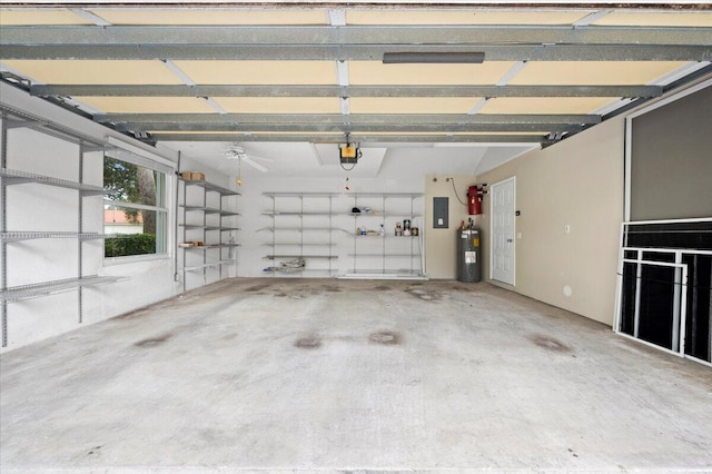 garage with a garage door opener and water heater