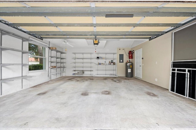 garage with a garage door opener, electric panel, and electric water heater