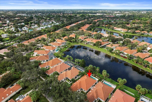 aerial view with a water view and a residential view