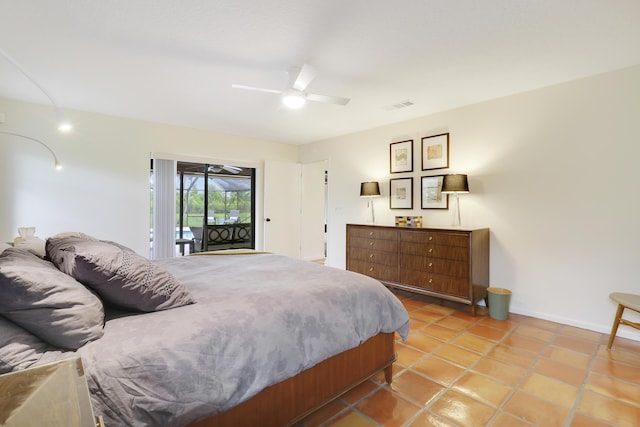 bedroom featuring ceiling fan, light tile patterned flooring, and access to exterior