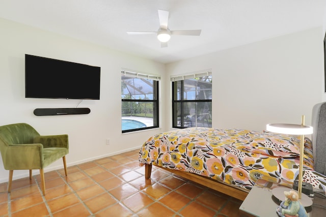 tiled bedroom with ceiling fan