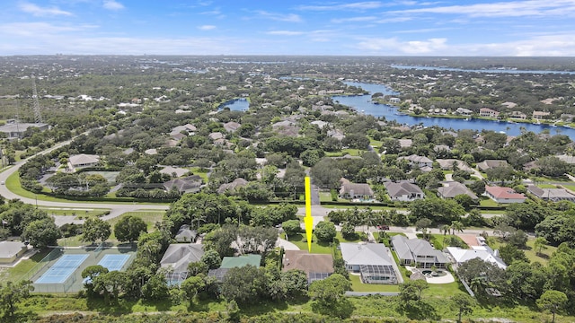 drone / aerial view with a water view