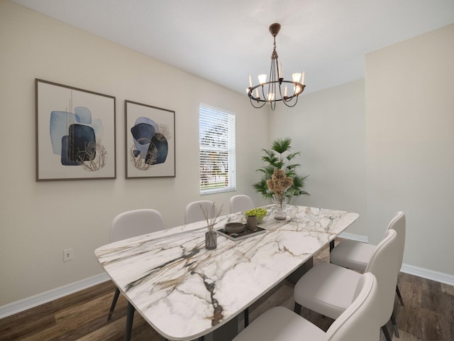 dining space featuring dark hardwood / wood-style floors and a notable chandelier